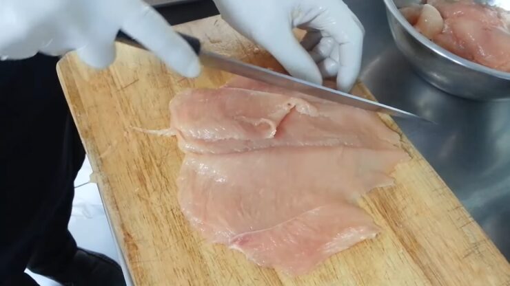 several cuts on the chicken before cooking